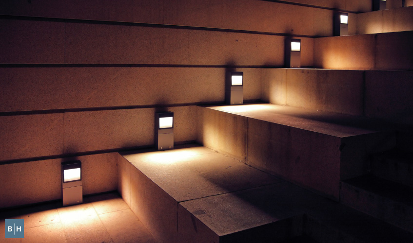 A lit up stairway on a Britton Home